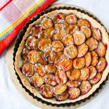 A plum tart on a table