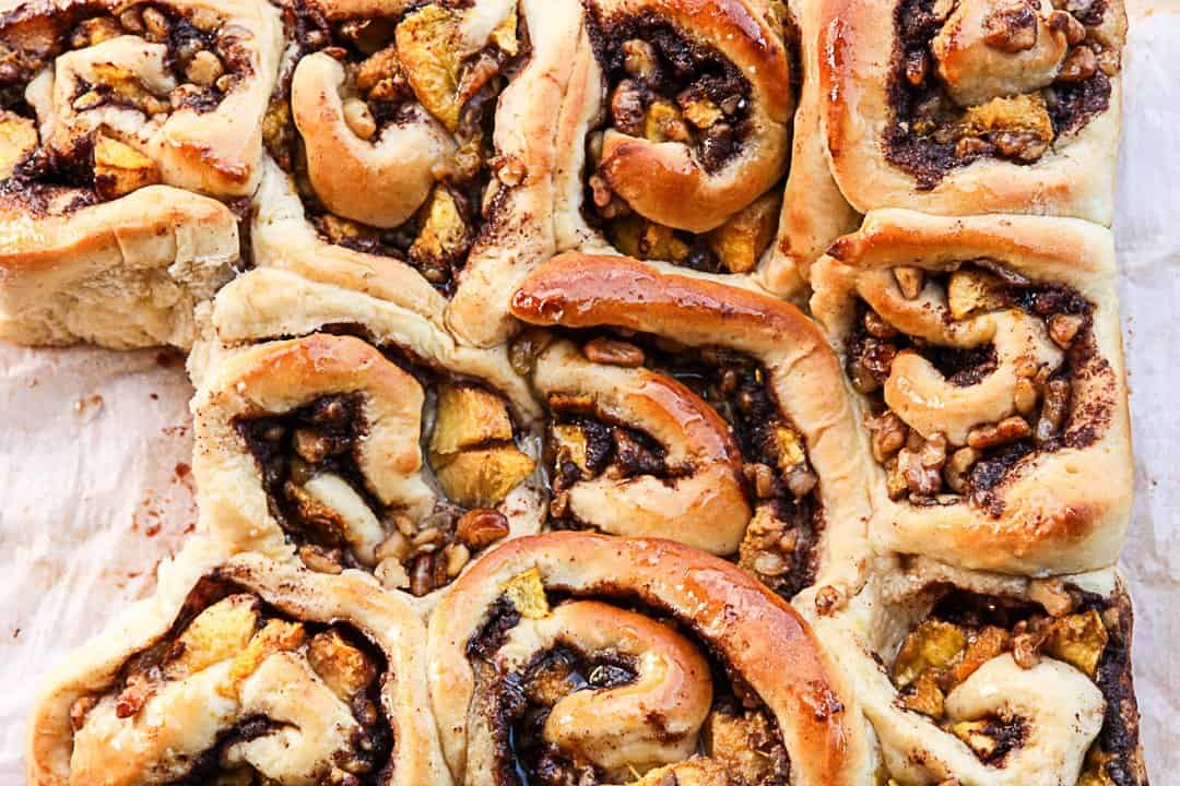 A close up of a pan of cinnamon rolls