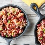 A pan of food sitting on top of a wooden table