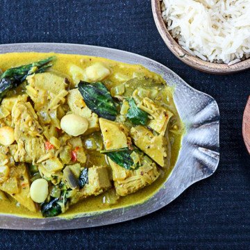 A plate of curry on a table, with Jackfruit