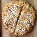 A round loaf of baked gluten-free Irish soda bread.