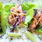 A plate of wraps, with Lettuce and Steak