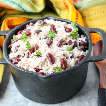 Jamaican rice and beans in a cast iron pot.