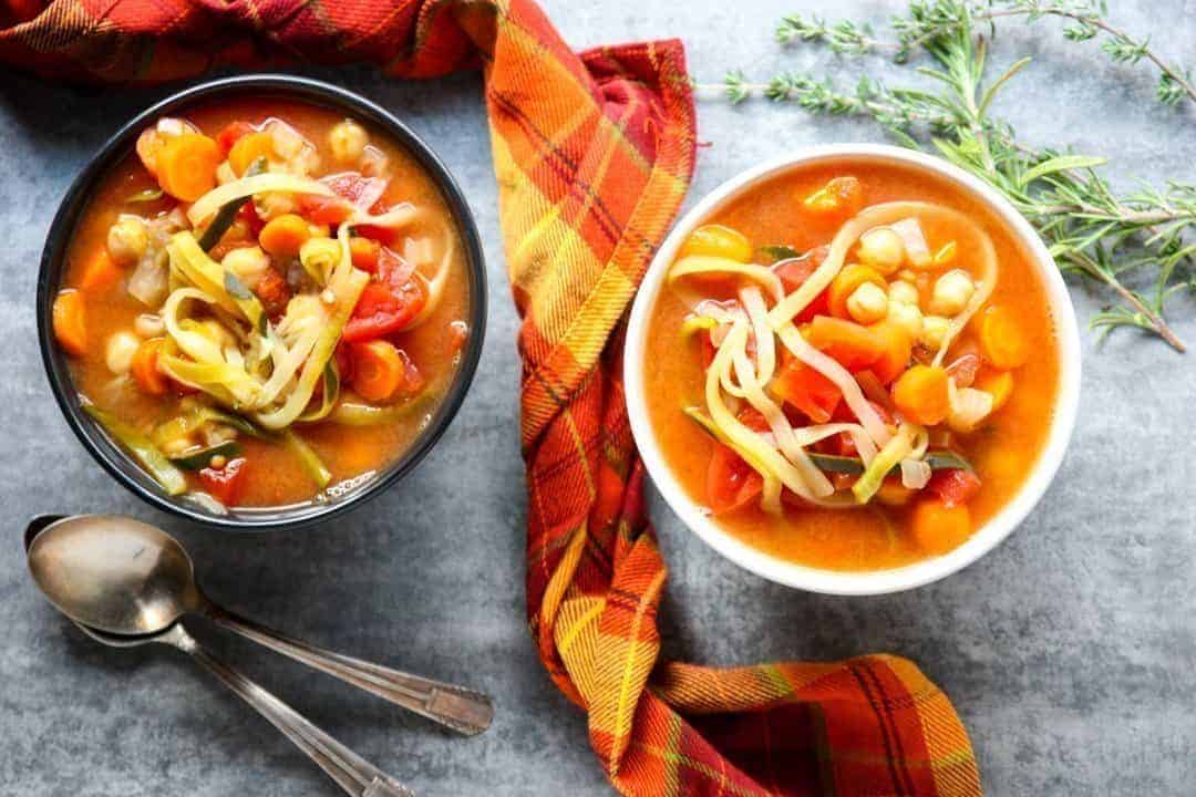 One White and One Black Bowl with Vegetable Zucchini Noodle Soup