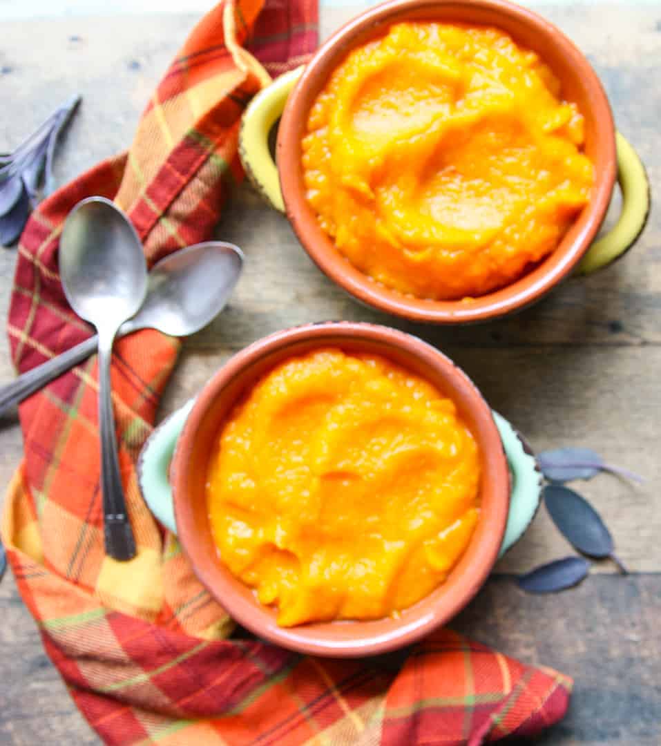 Two bowls and two spoons with Butternut squash