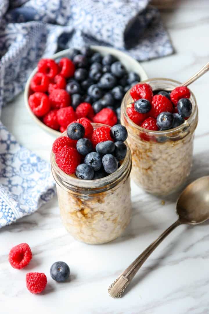 Oatmeal in jars with berries