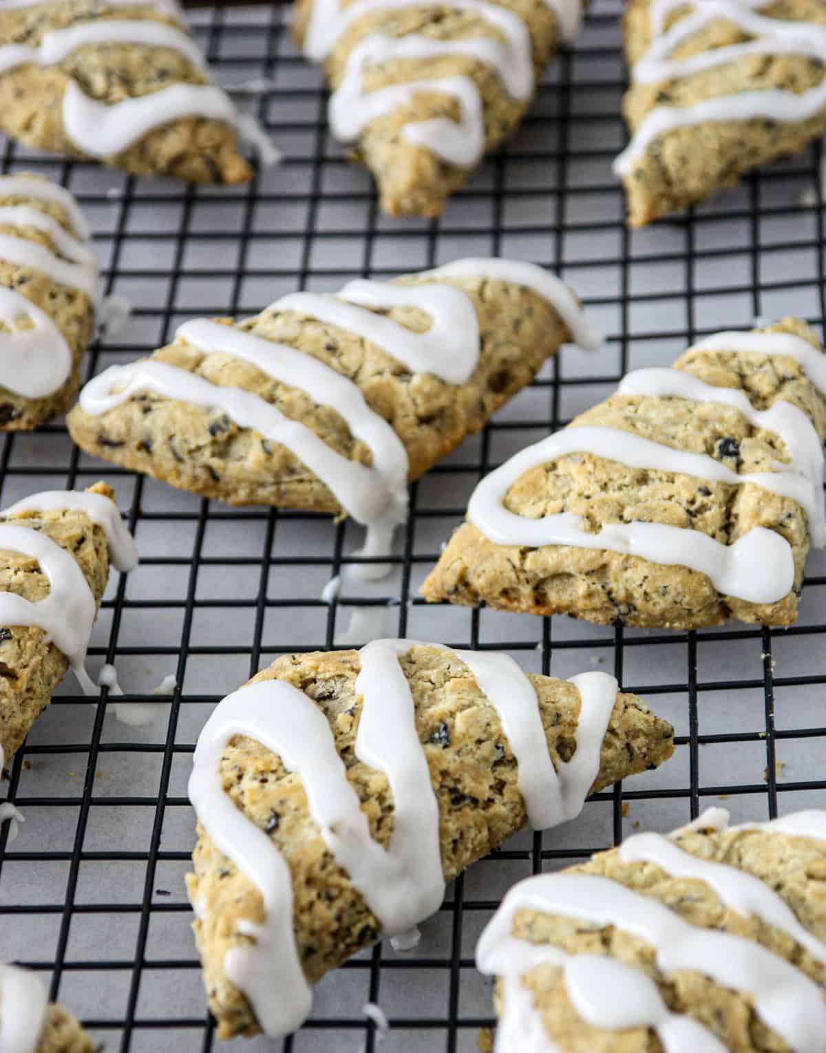 Earl grey scones on a wire rack.