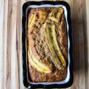 A top down shot of the baked loaf in a pan.