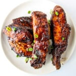 Air fryer country style ribs covered in barbecue sauce.