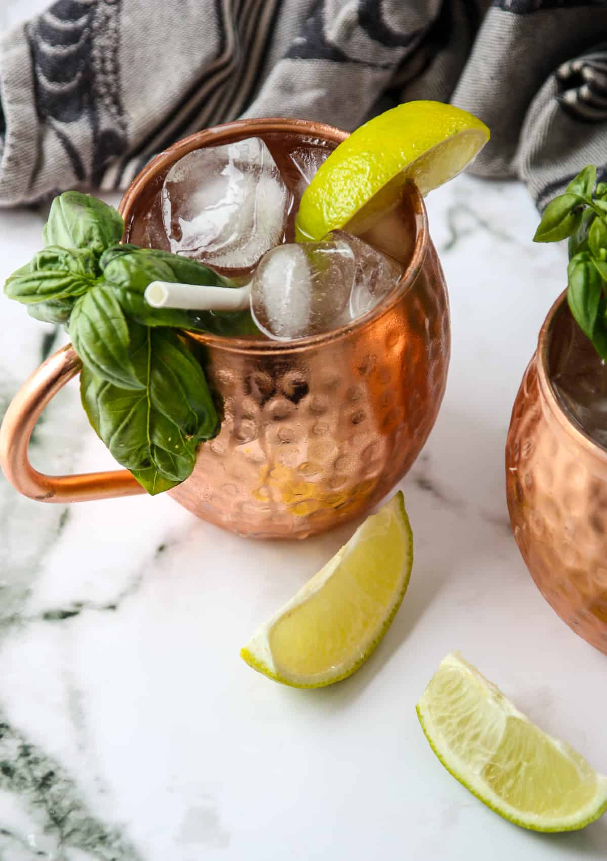 Two copper mugs with Irish mule cocktails.