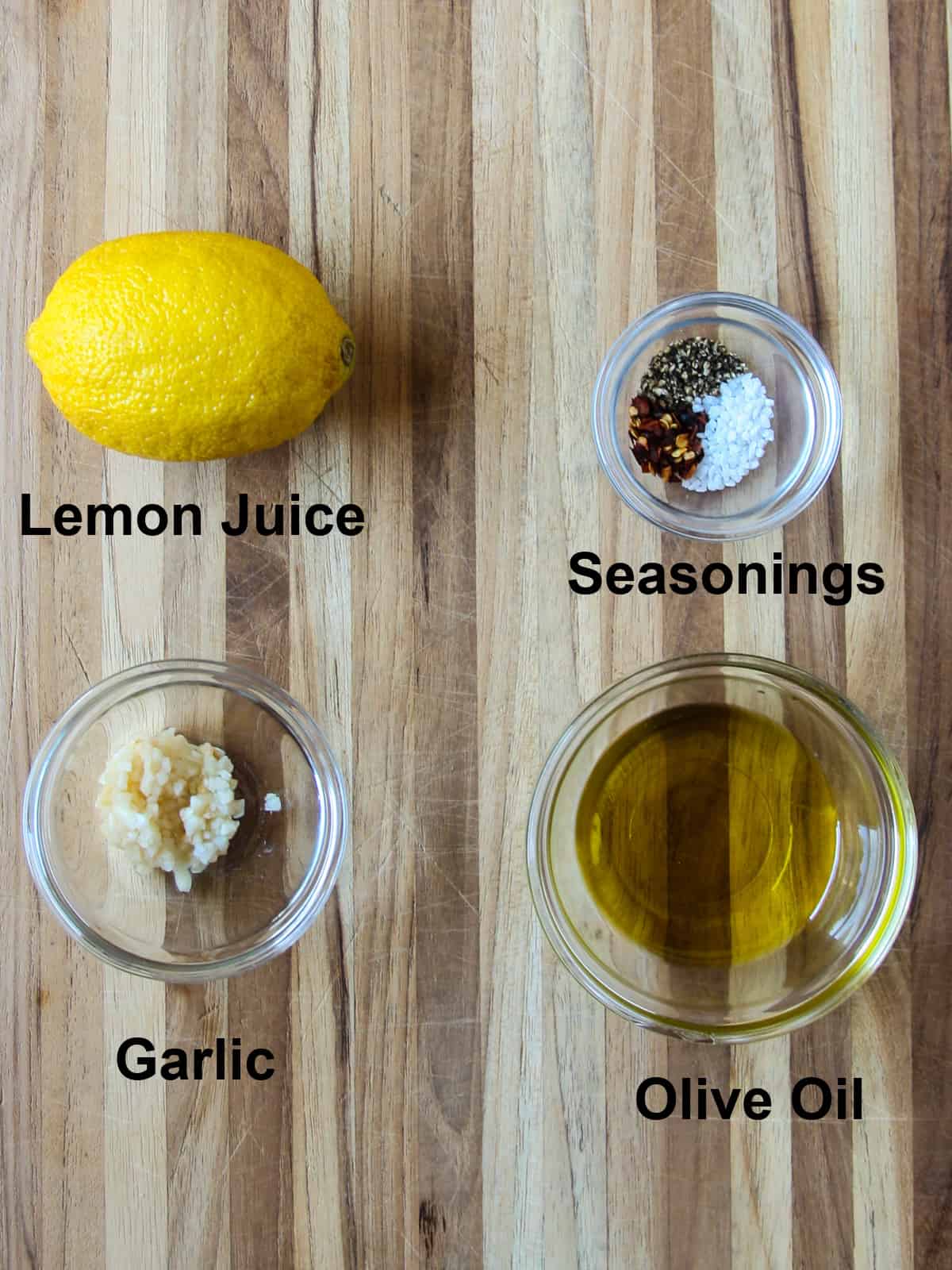 The remaining ingredients needed for making the soup, in glass bowls.