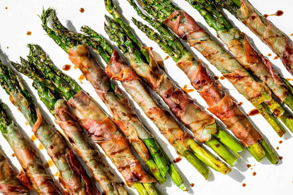 Several prosciutto wrapped asparagus spears.