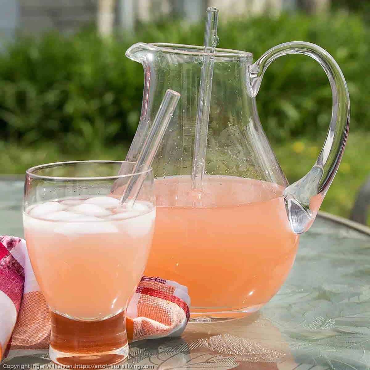 A glass pitcher of rhubarb lemonade.