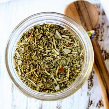 Italian seasoning in a glass jar.
