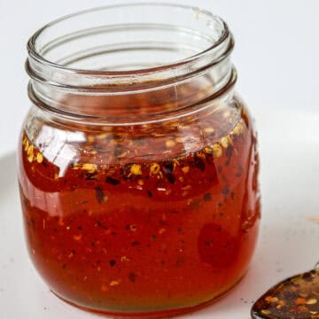 Hot honey sauce in a glass jar.